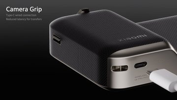 Detachable grip with a two-stage shutter button,